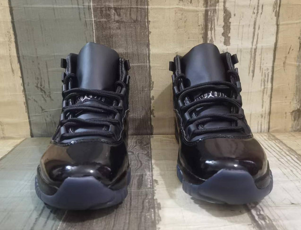 Air Jordan 11 Retro x Comme des Garçons Homme Plus “Black”