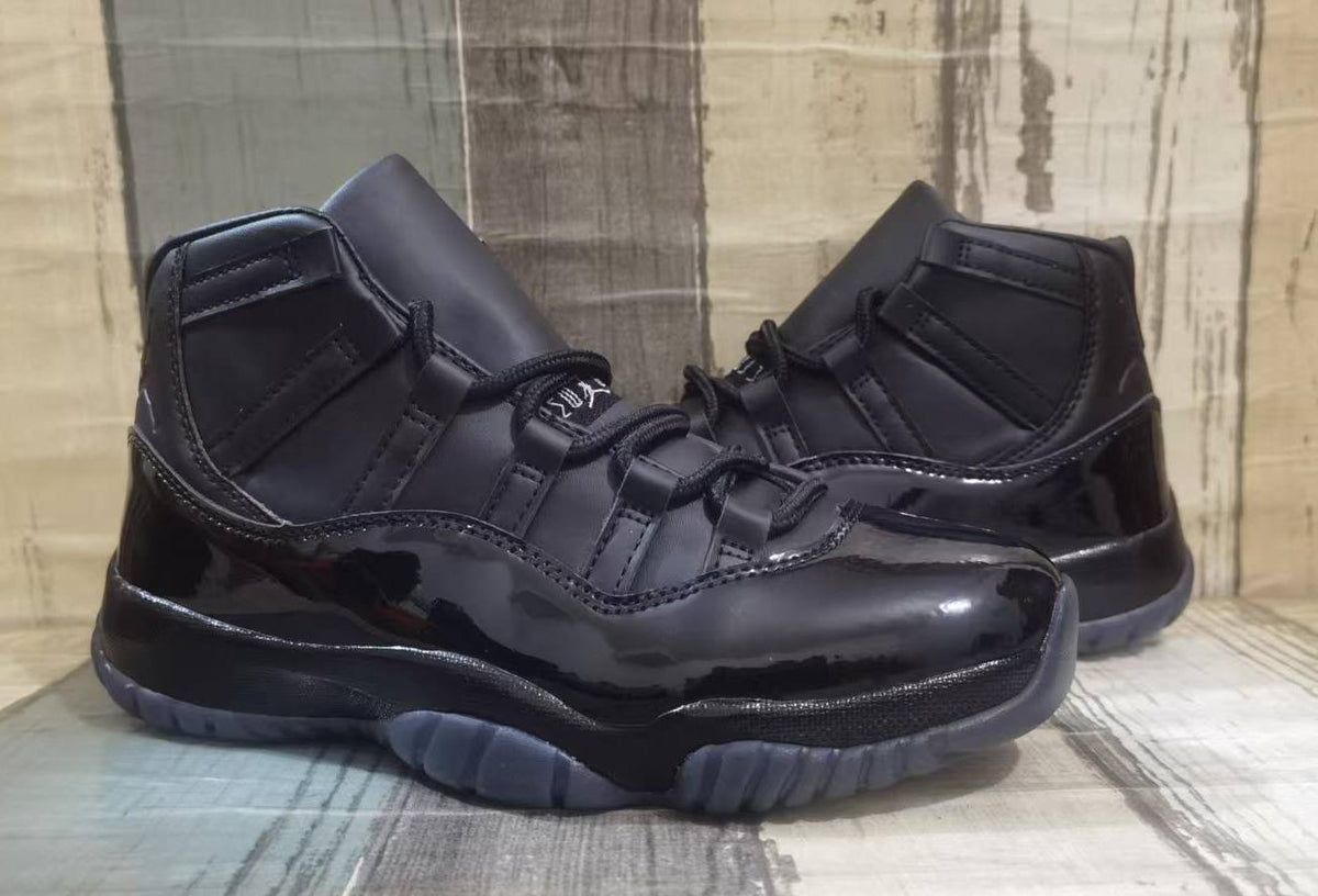 Air Jordan 11 Retro x Comme des Garçons Homme Plus “Black”